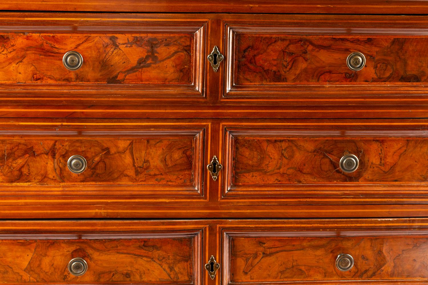 An Italian Walnut Chest of Drawers