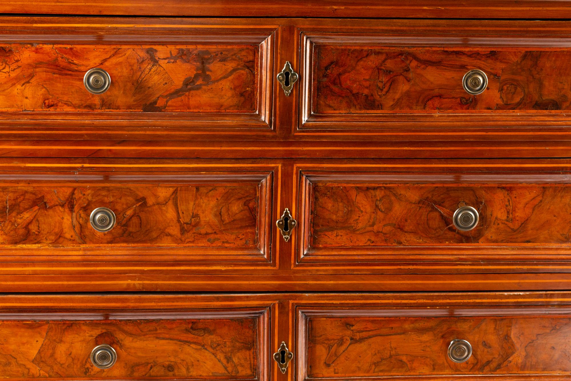 An Italian Walnut Chest of Drawers