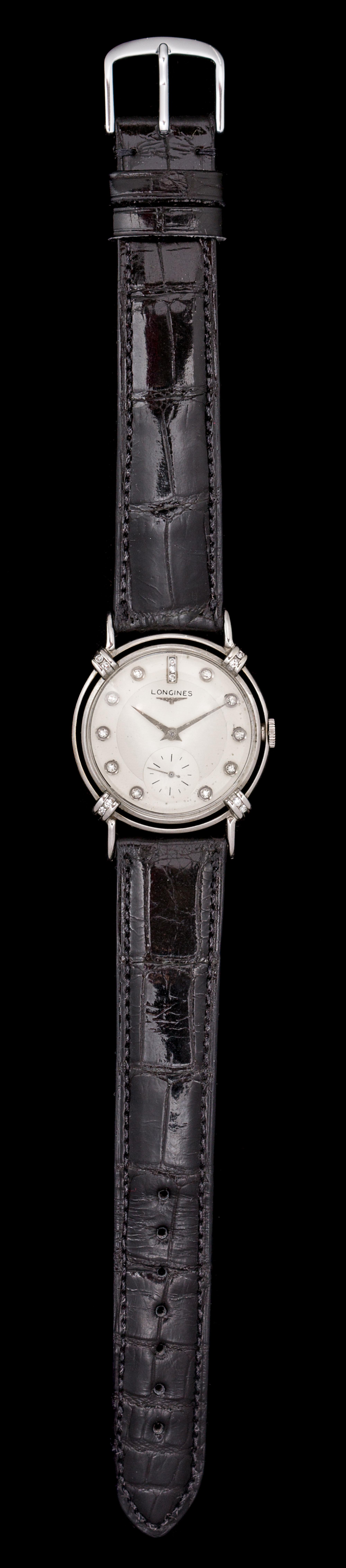 A 14 Karat White Gold and Diamond Wristwatch, Longines, Circa 1952,