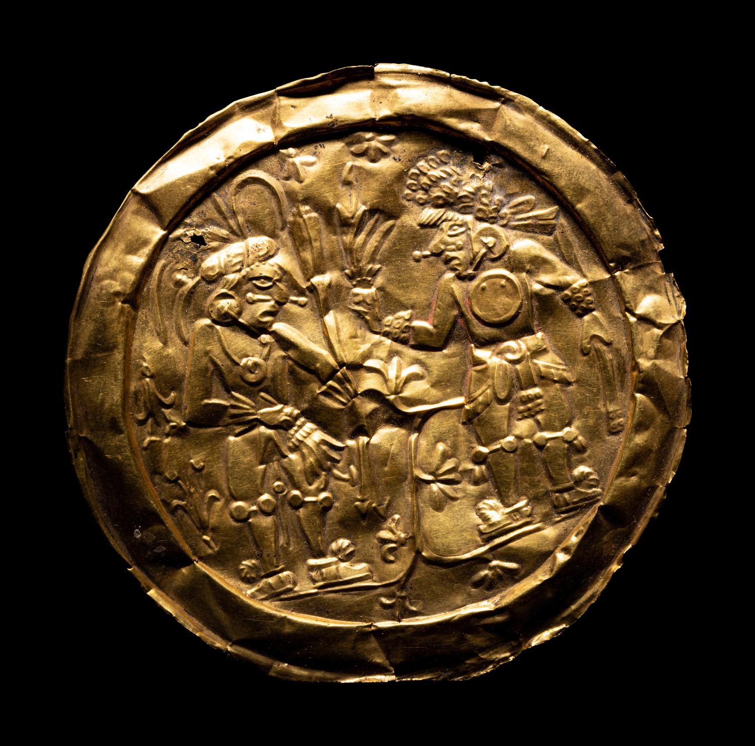 An Aztec or Toltec Gold Embossed Disc