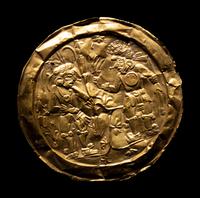 An Aztec or Toltec Gold Embossed Disc