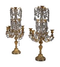 A Pair of Gilt-Bronze and Crystal Five-Light Candelabra