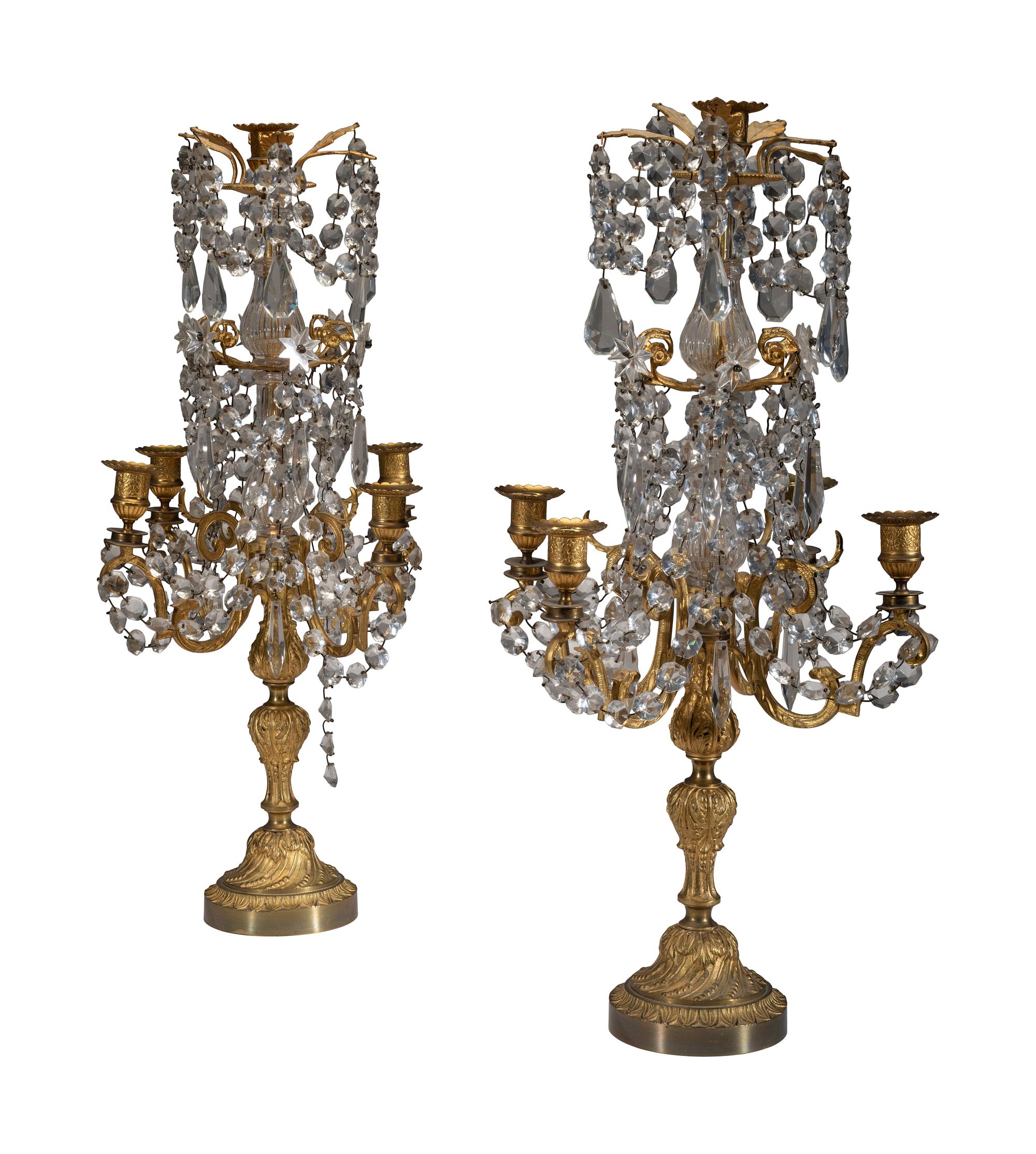 A Pair of Gilt-Bronze and Crystal Five-Light Candelabra
