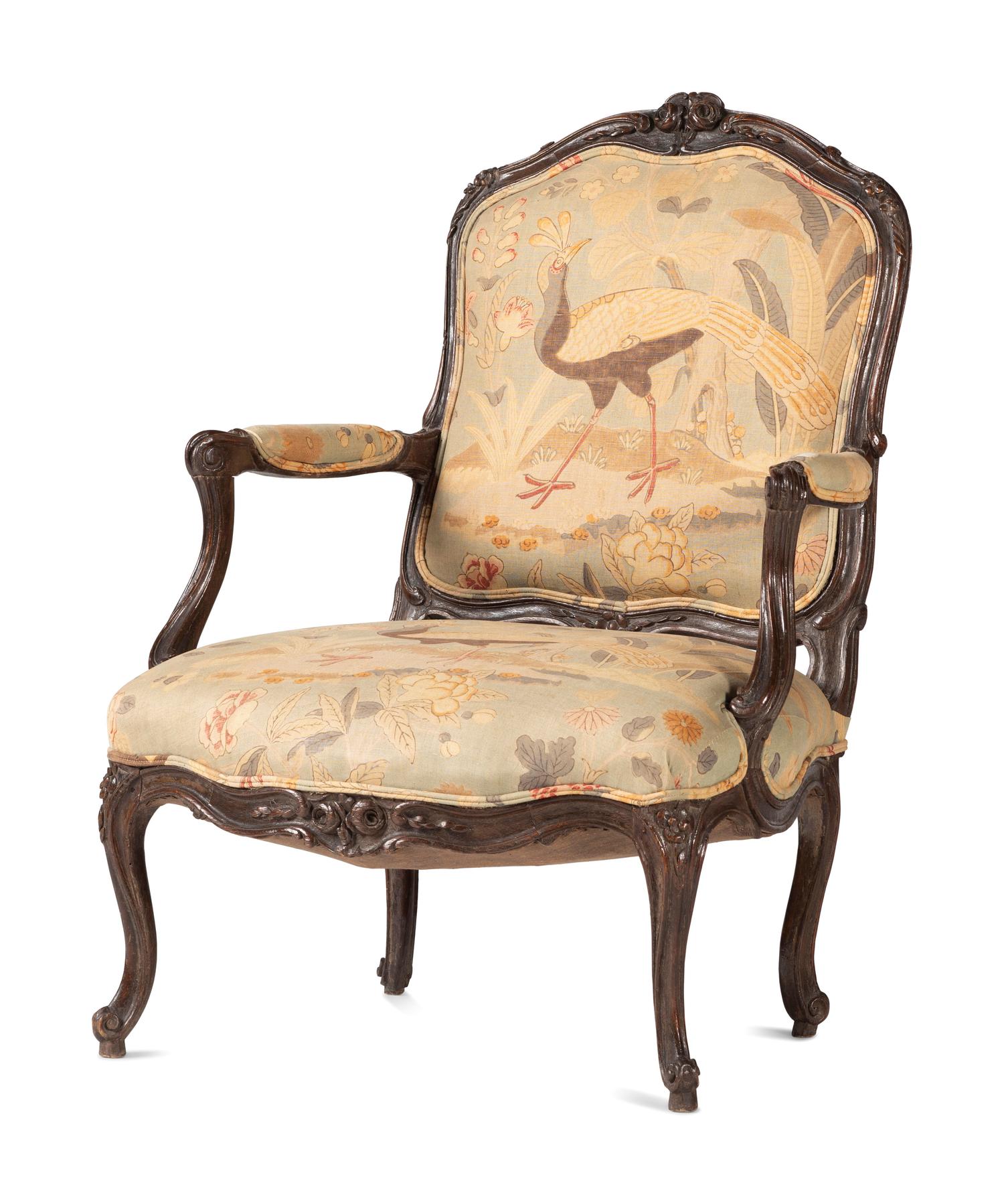 A Louis XV Carved Walnut Upholstered Fauteuil