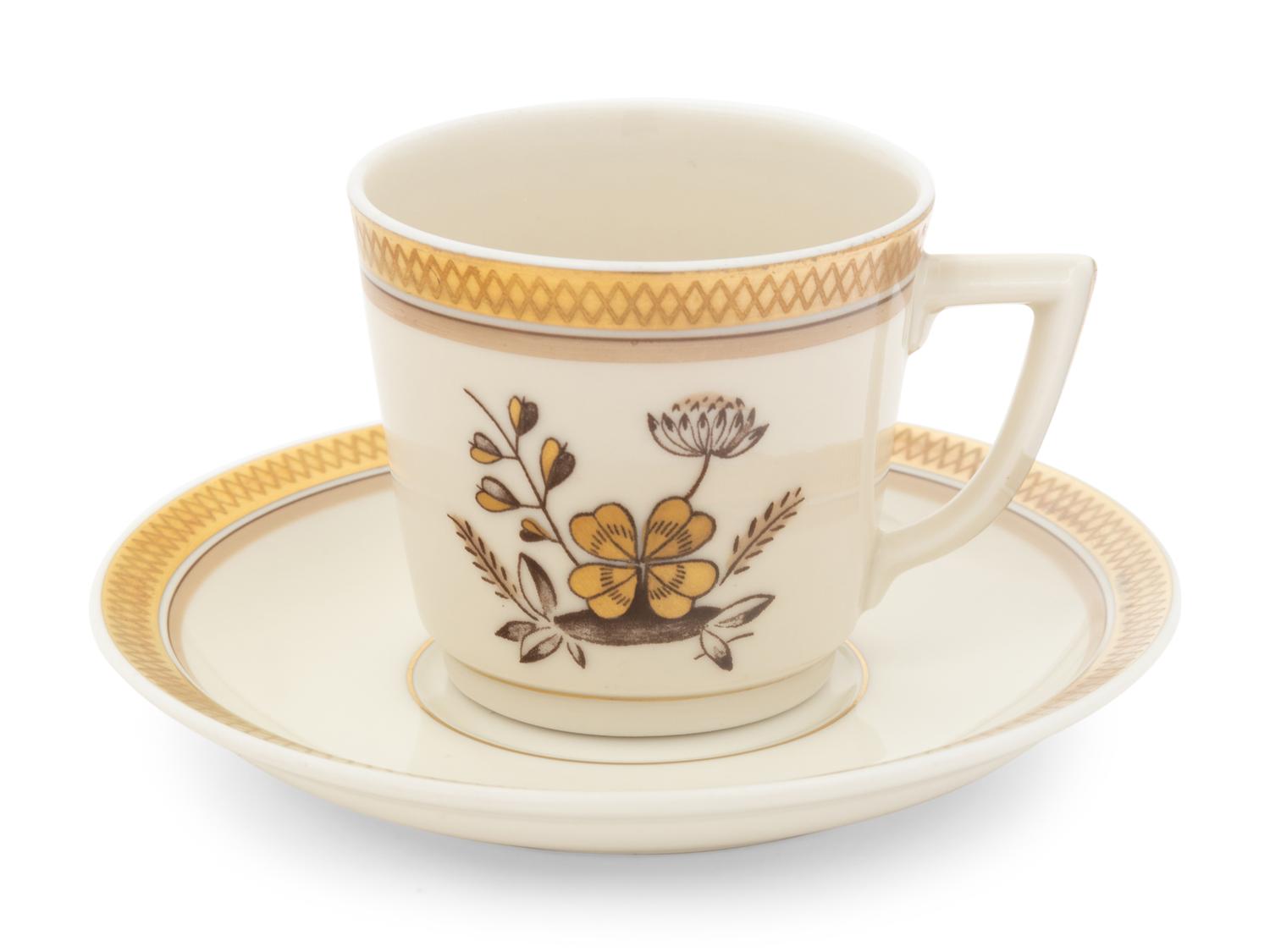 A Royal Copenhagen Golden Clover Porcelain Service for Twelve