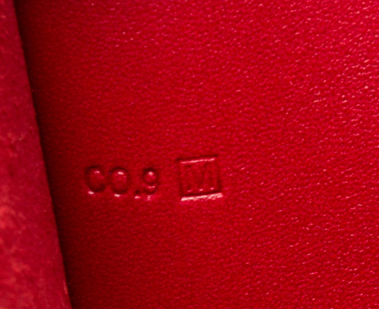 An Hermes Rouge Leather Passport Pouch, 7" x 8" x 1".