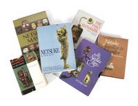 [JAPANESE ART: INRO & NETSUKE] A collection of fourteen reference books pertaining to the study of lacquer, inro, and netsuke, comprising: