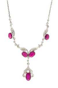 A Collection of White Gold, Ruby, and Diamond Jewelry, 7.80 dwts.
