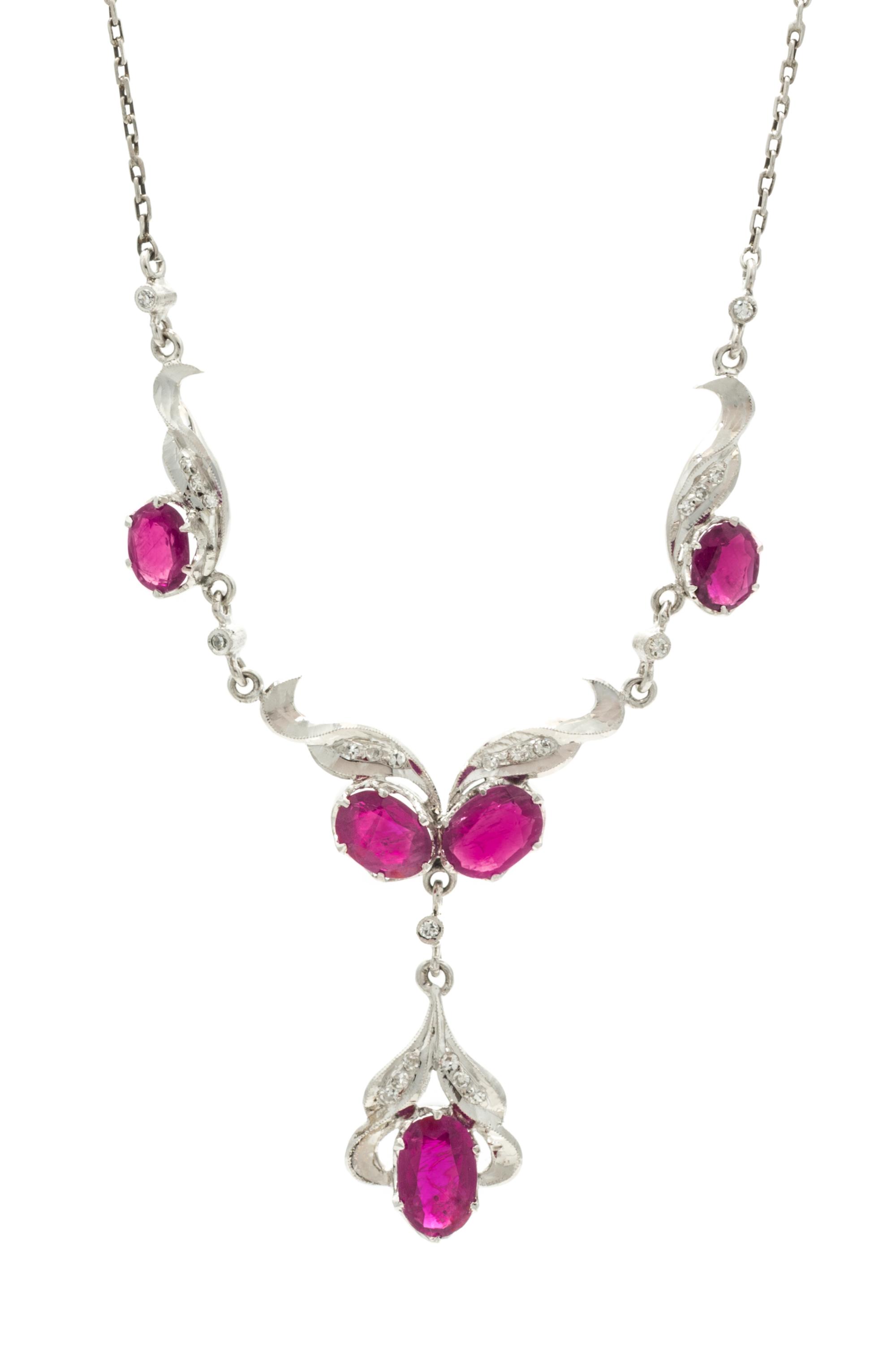 A Collection of White Gold, Ruby, and Diamond Jewelry, 7.80 dwts.