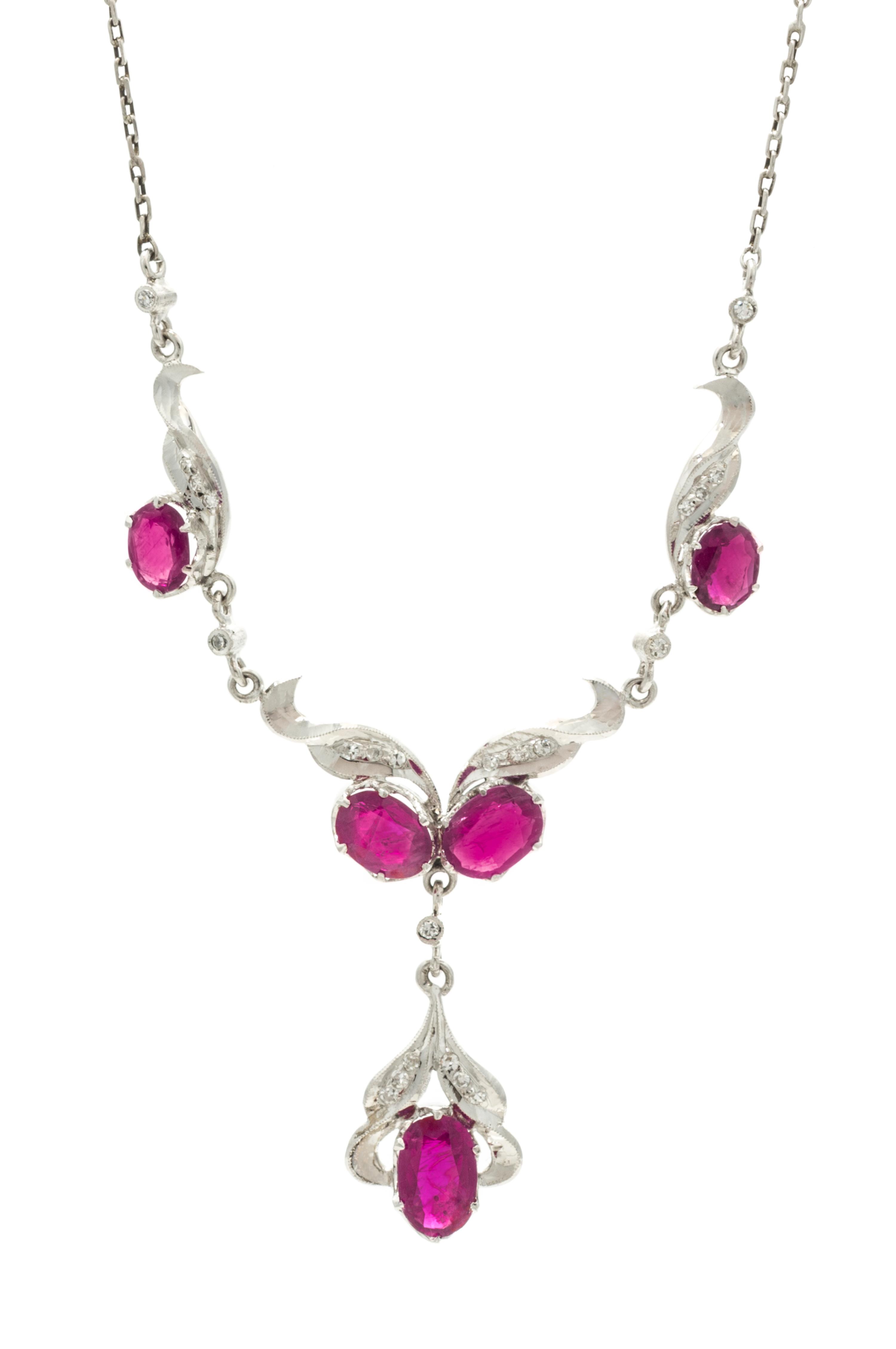 A Collection of White Gold, Ruby, and Diamond Jewelry, 7.80 dwts.