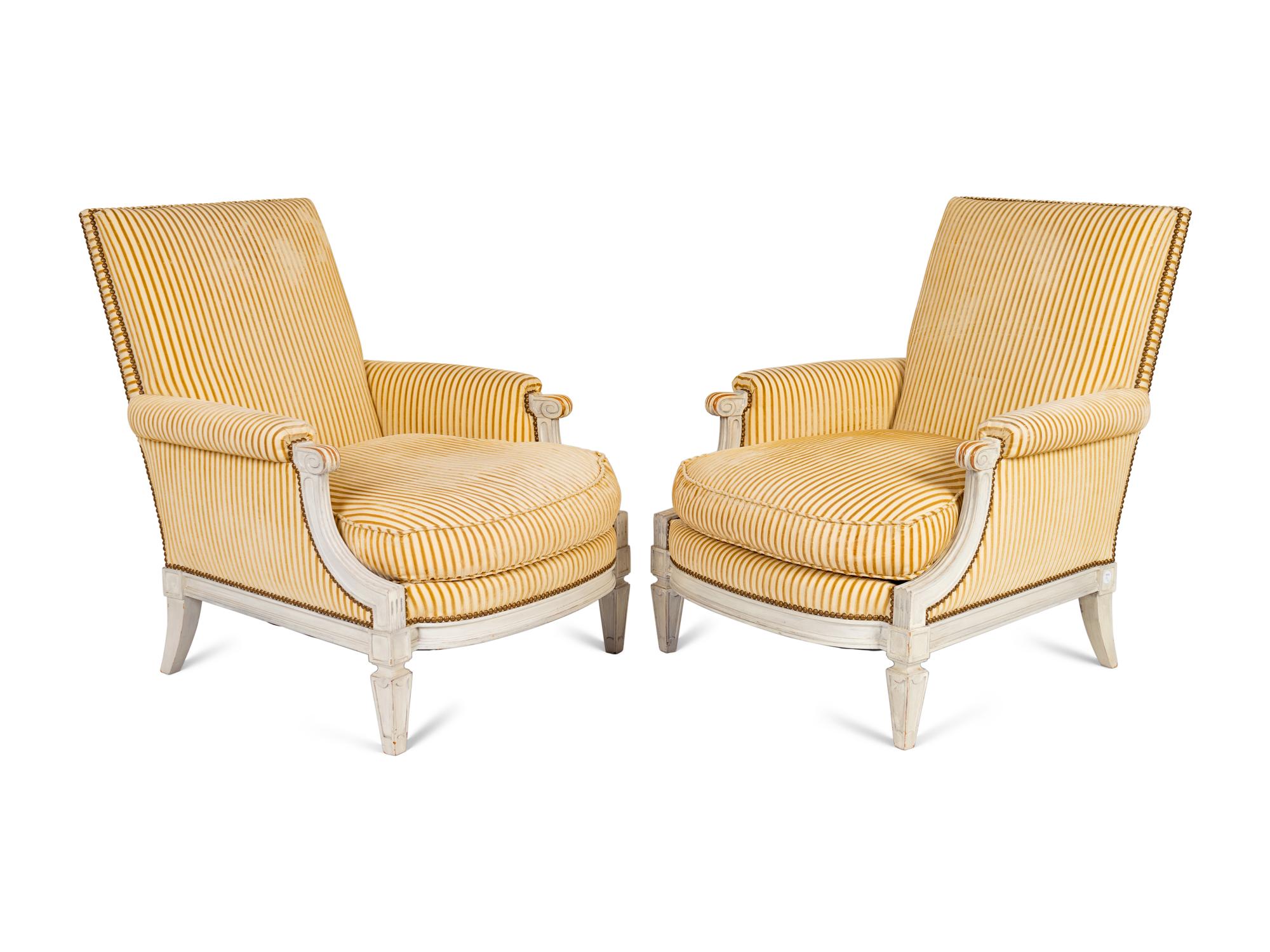 A Pair of Louis XVI Style Carved and Painted Bergeres — 19TH/20TH CENTURY