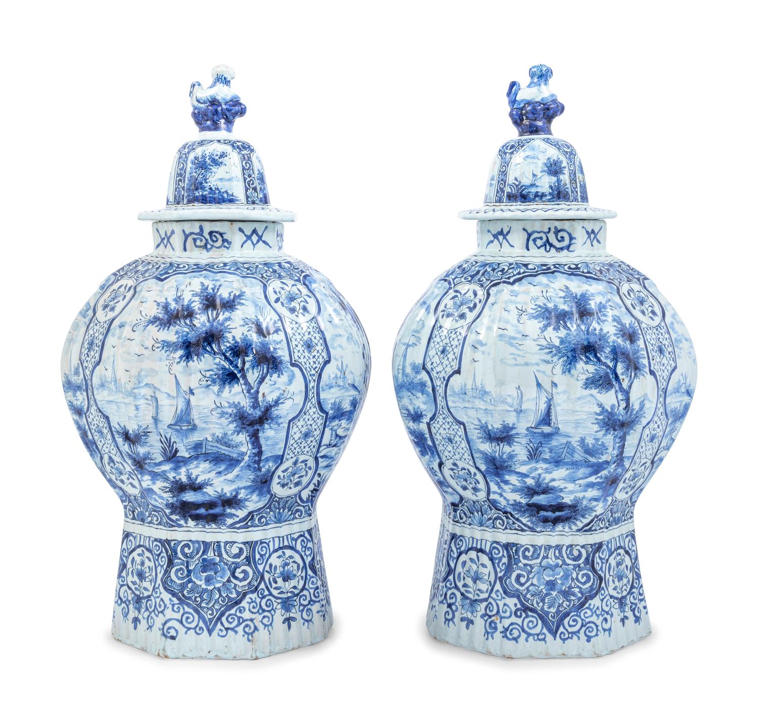 A Pair of Large Delftware Vases and Covers