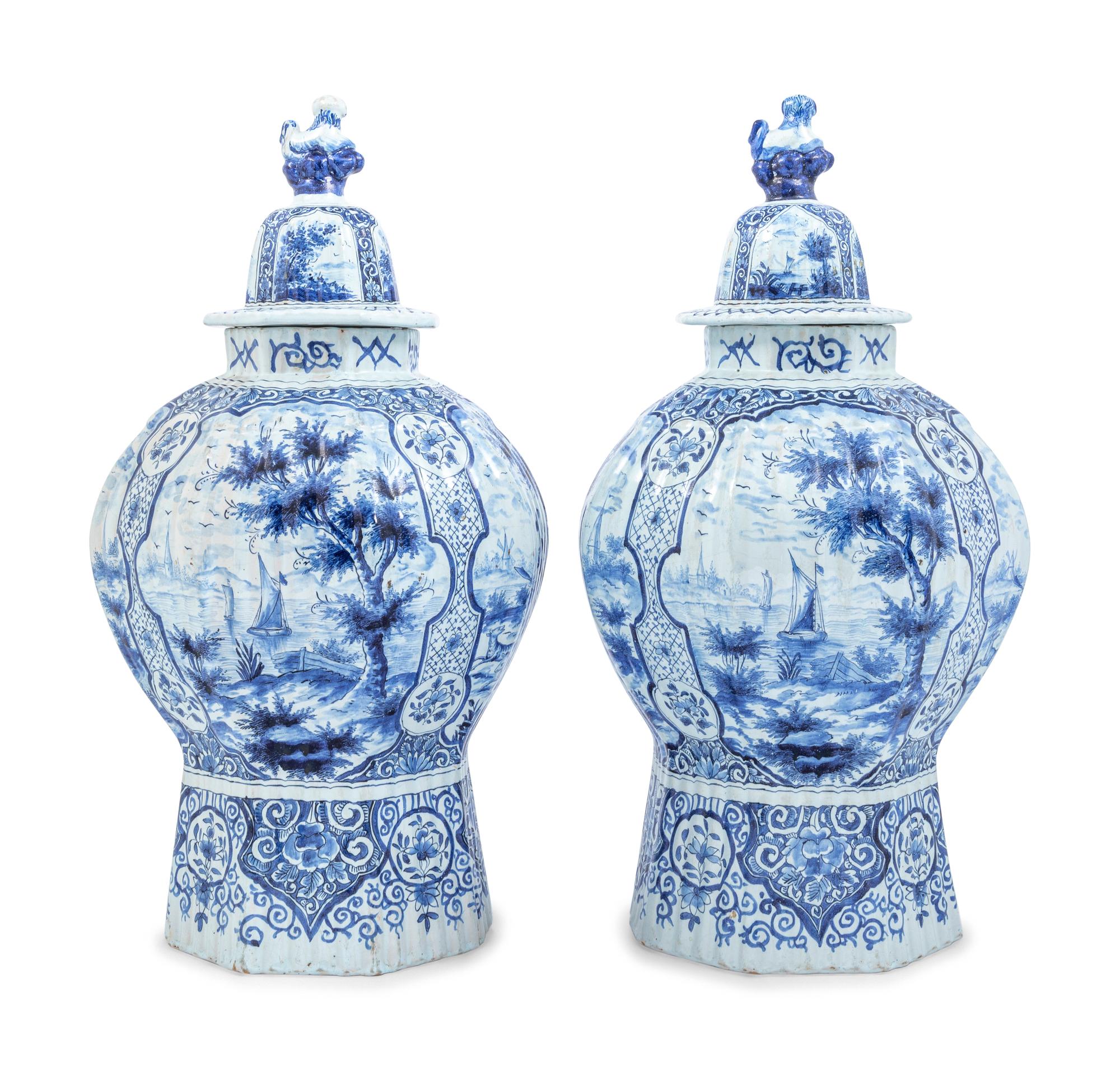 A Pair of Large Delftware Vases and Covers