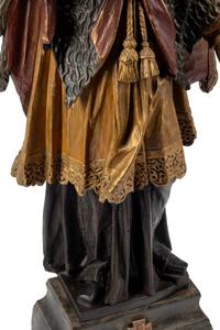 An Italian Carved and Painted Saint Figure and Stand