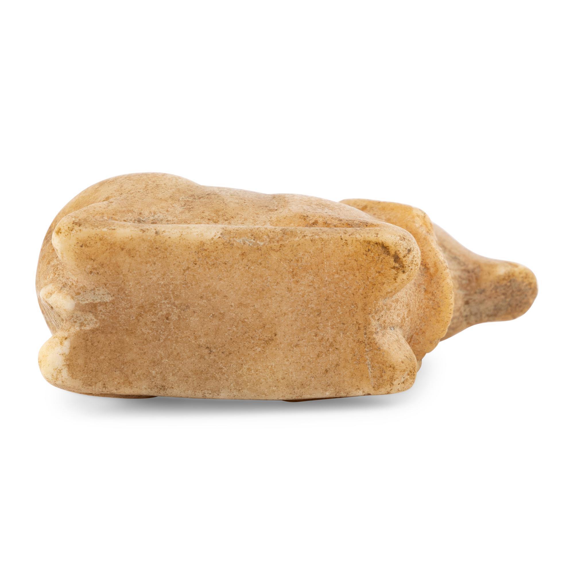 A Western Asiatic Style Alabaster Vessel in The Form of an Ibex