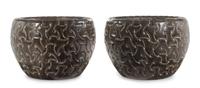 A Pair of Celtic Style Carved Stone Jardinieres Height 16 1/2 x diameter 23 inches. — 20TH CENTURY