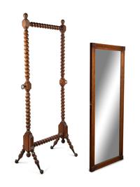 A Louis Philippe Carved Mahogany Cheval Mirror