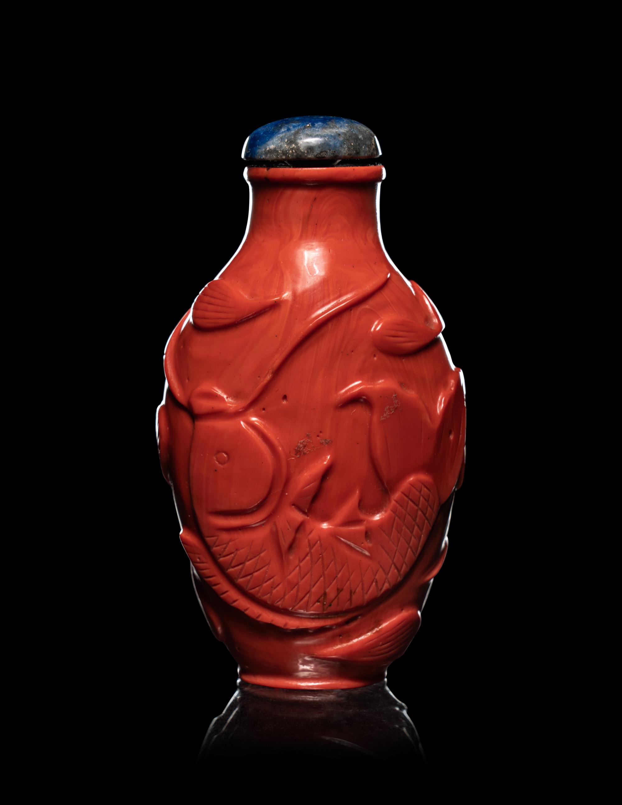 A Chinese Carved Red Coral Snuff Bottle