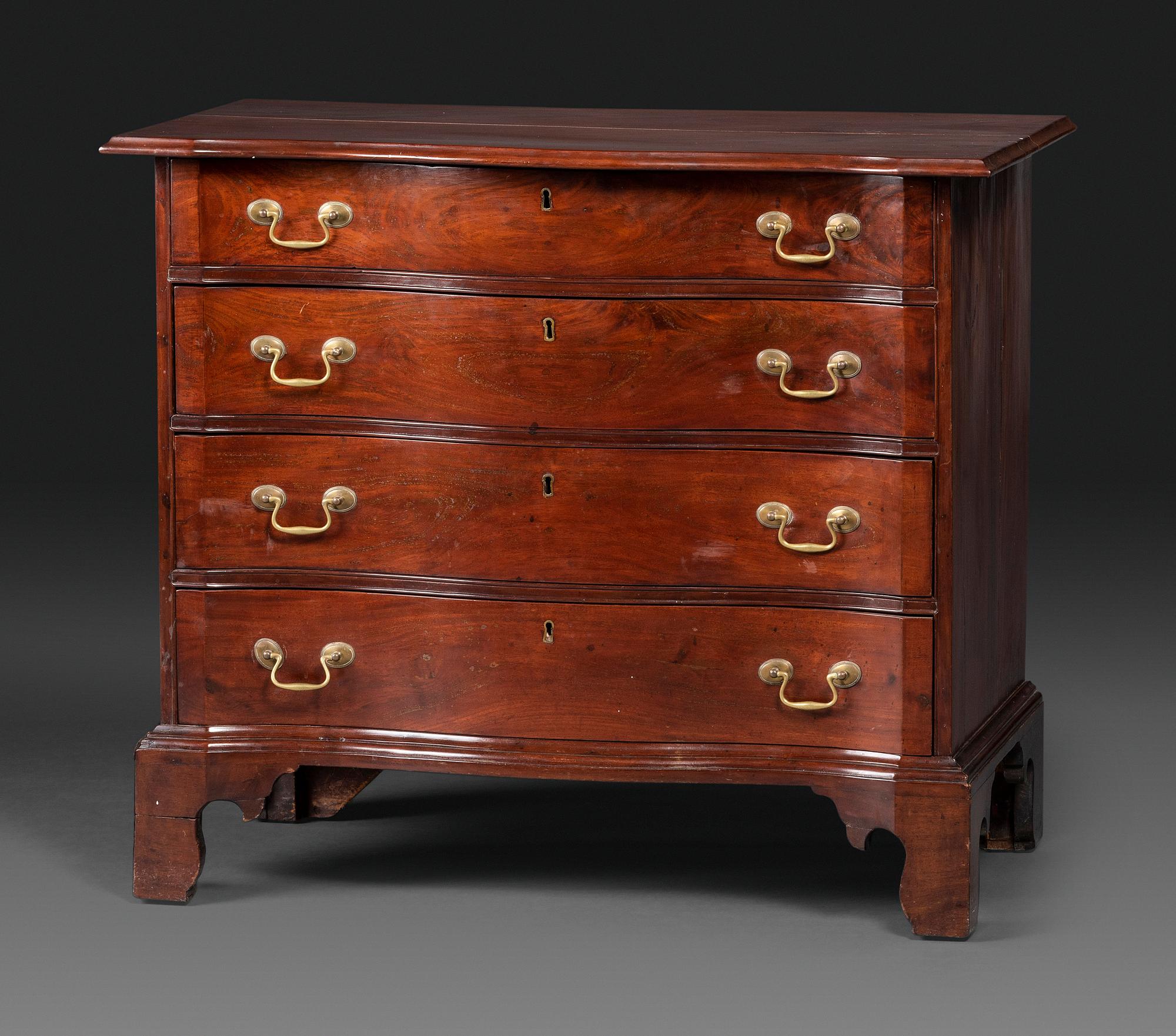 A Chippendale Mahogany Serpentine Chest of Drawers