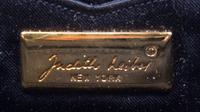 A Judith Leiber Navy Nylon Clutch, 6.5" x 3.5" x 1".
