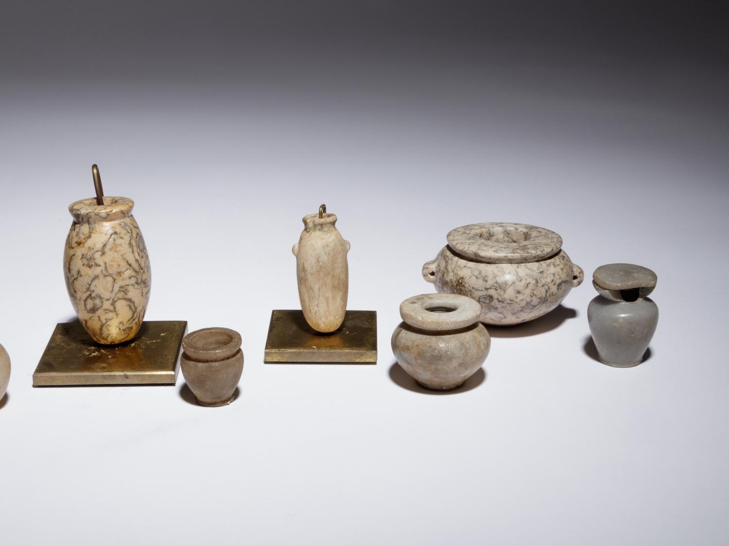 Twelve Egyptian Alabaster, Breccia and Other Stone Vessels