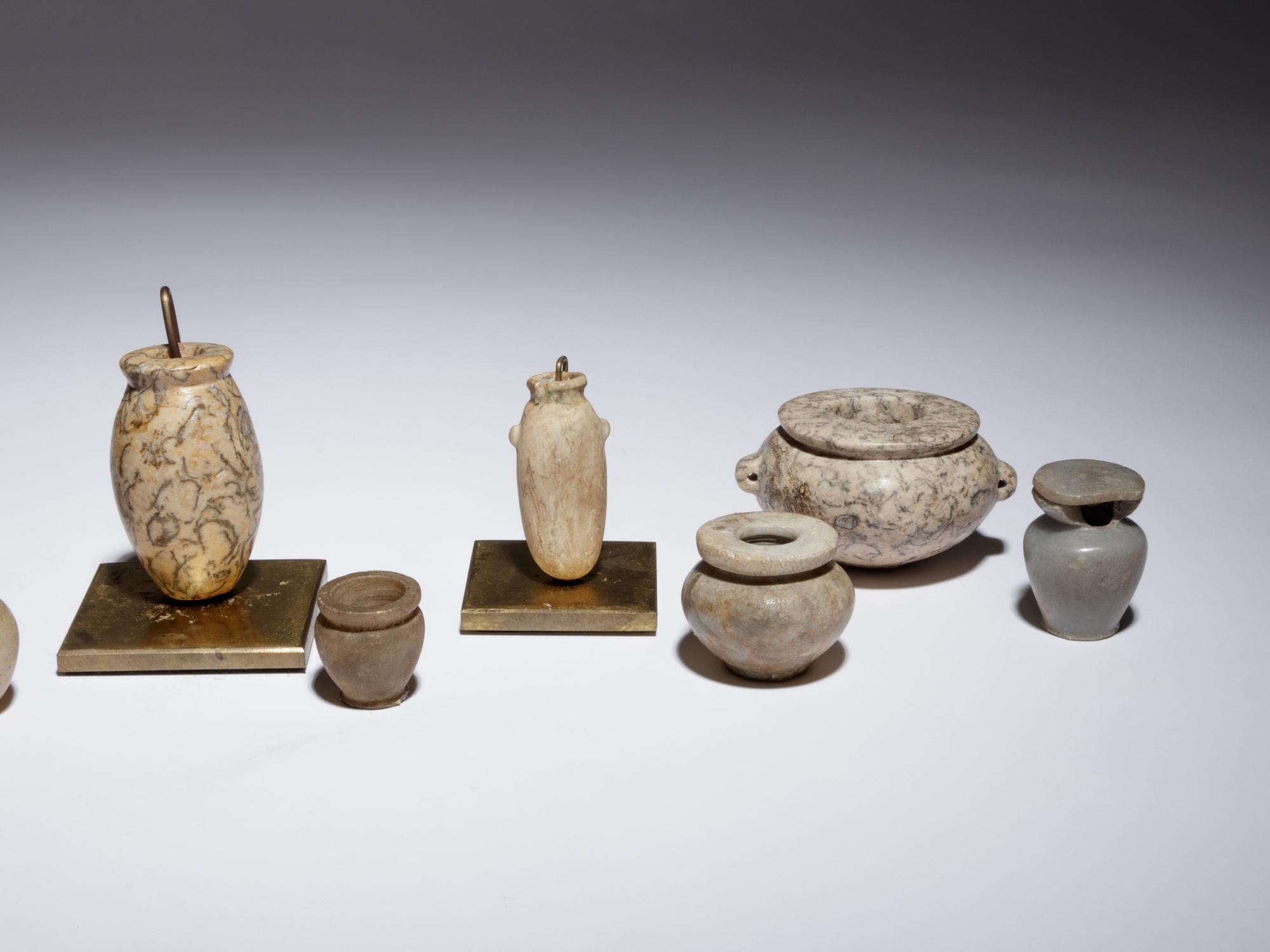 Twelve Egyptian Alabaster, Breccia and Other Stone Vessels