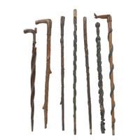 Group of seven carved and painted canes late 19th/early 20th century