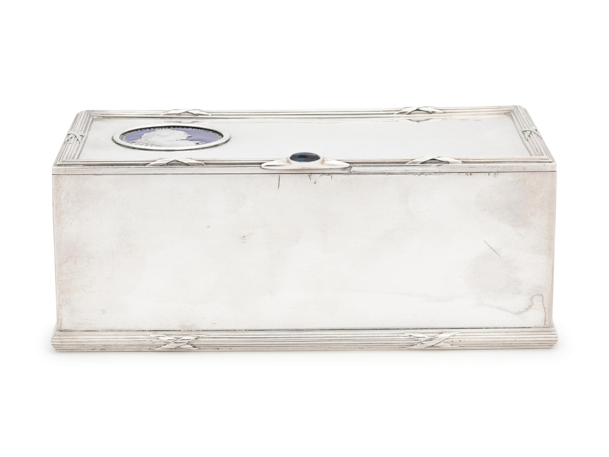 A Russian Silver and Enameled Coin-Inset Table-Top Cigarette Box