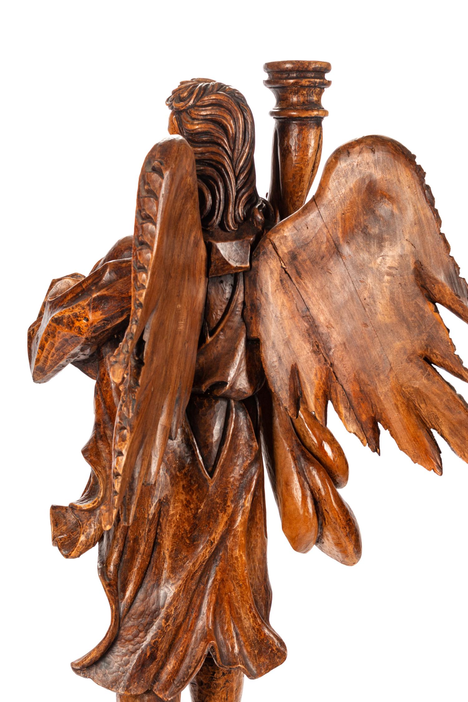 A Pair of Italian Carved Wood Figural Torchères