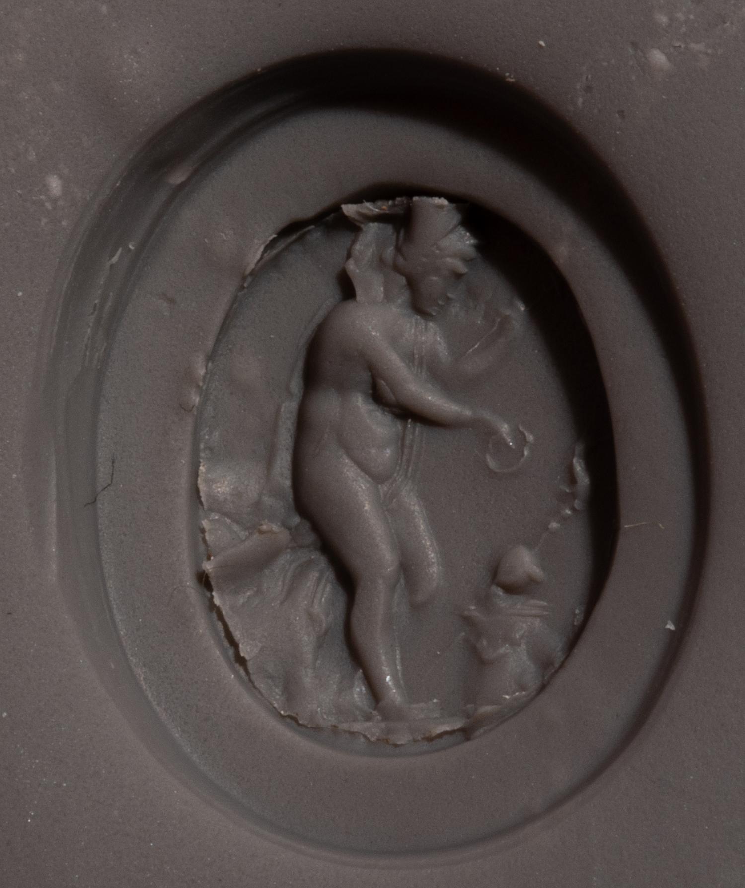 A Neoclassical Gold and Carnelian Finger Ring with the Goddess Ceres at an Alter
