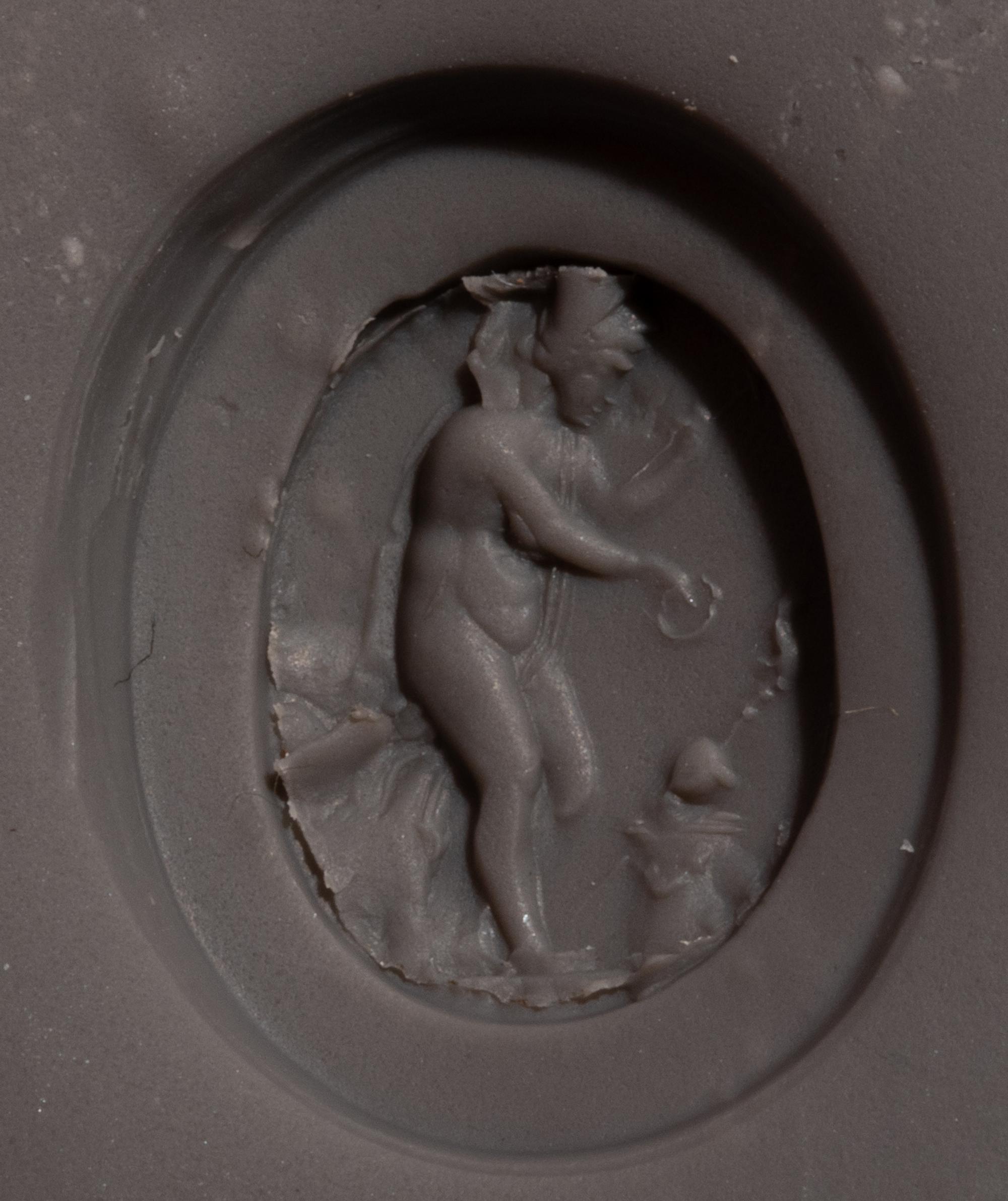A Neoclassical Gold and Carnelian Finger Ring with the Goddess Ceres at an Alter