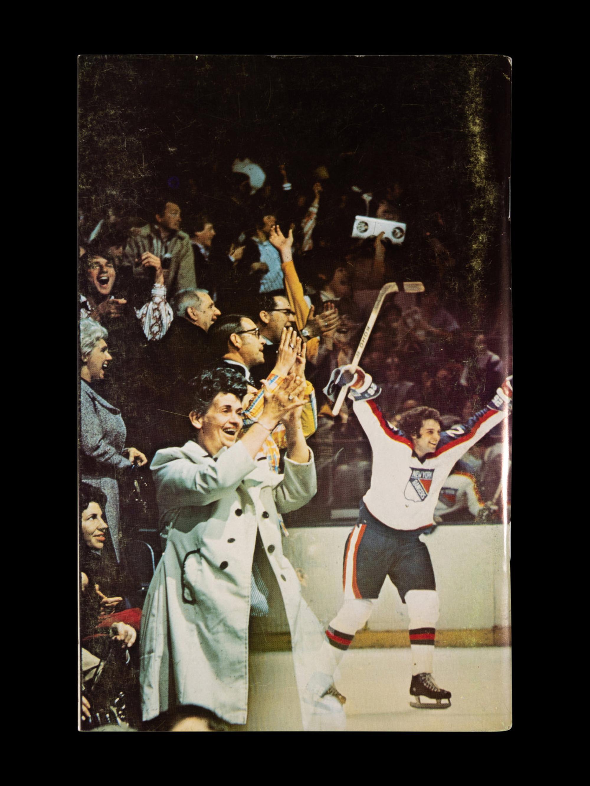 A Group of 16 1960s - 1980s New York Rangers Blue Book Media Guides,