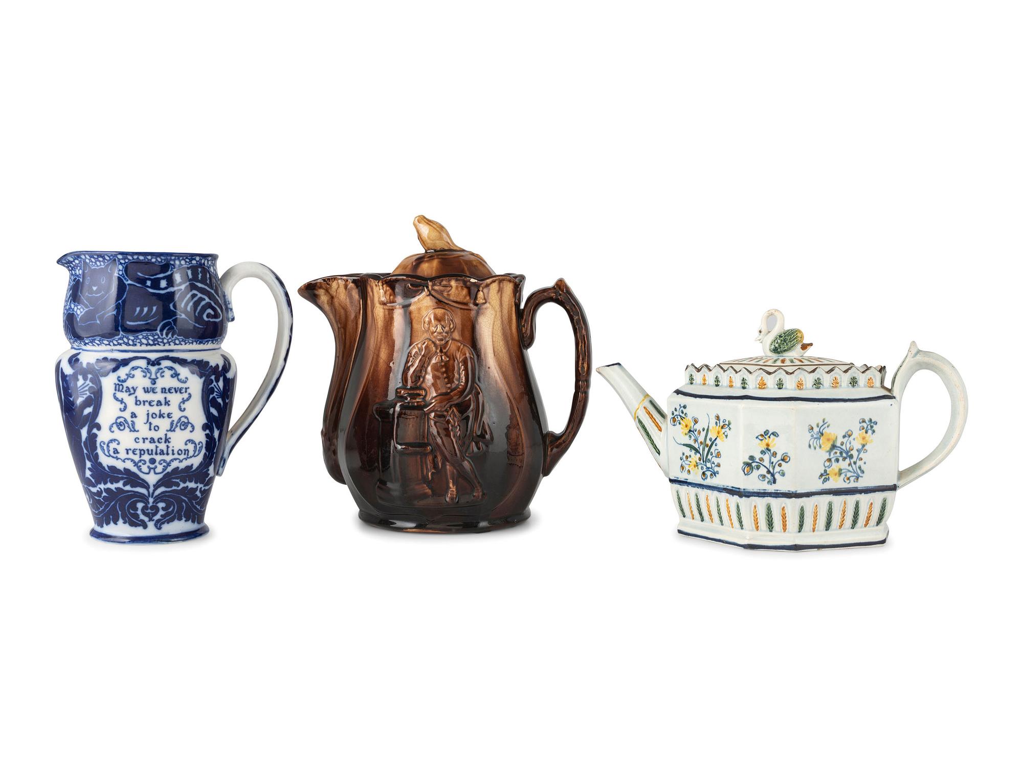 A Creamware Teapot, Rockingham Pitcher, and Royal Doulton Pitcher