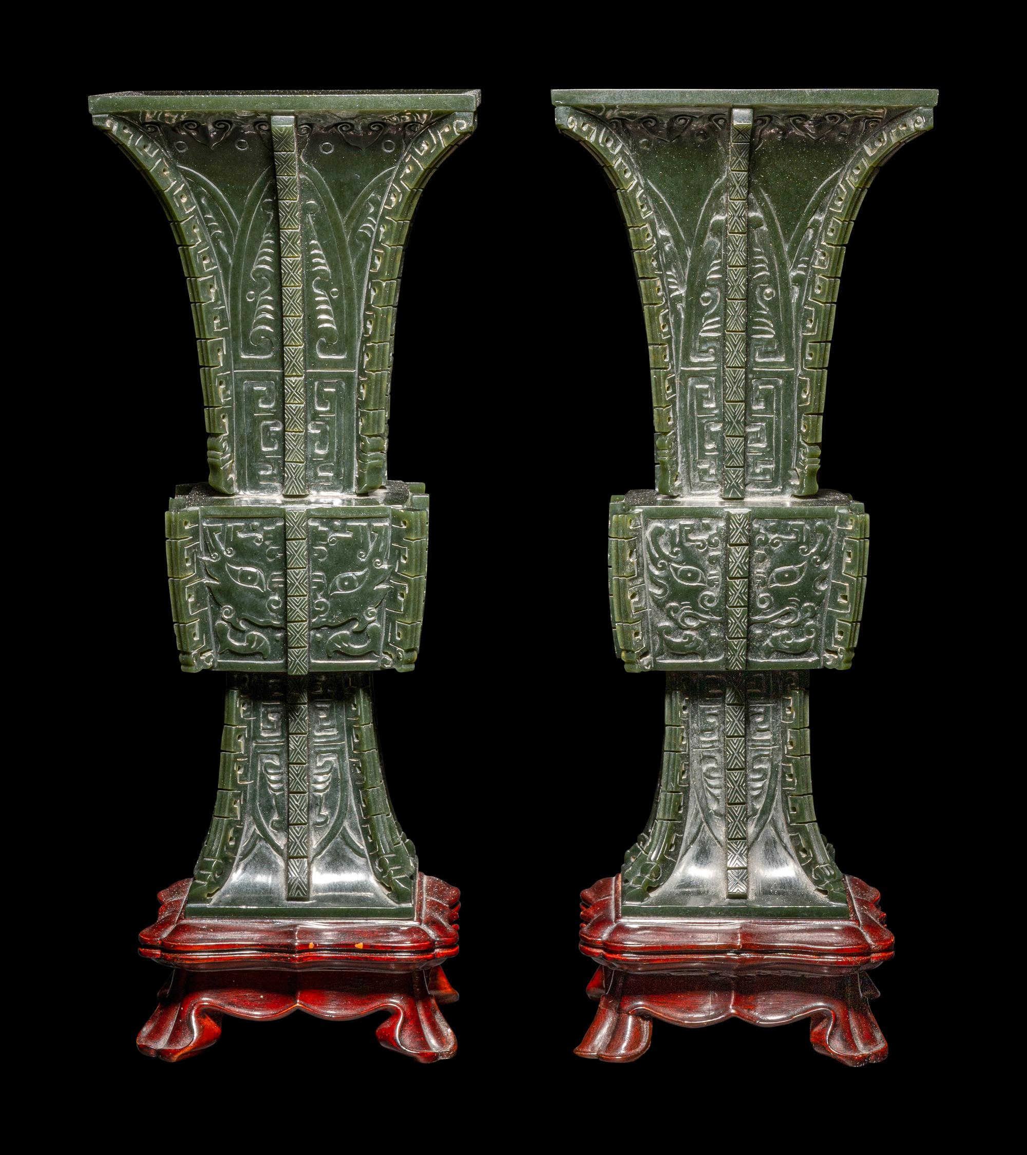 A Pair of Spinach Jade 'Taotie' Gu Vases