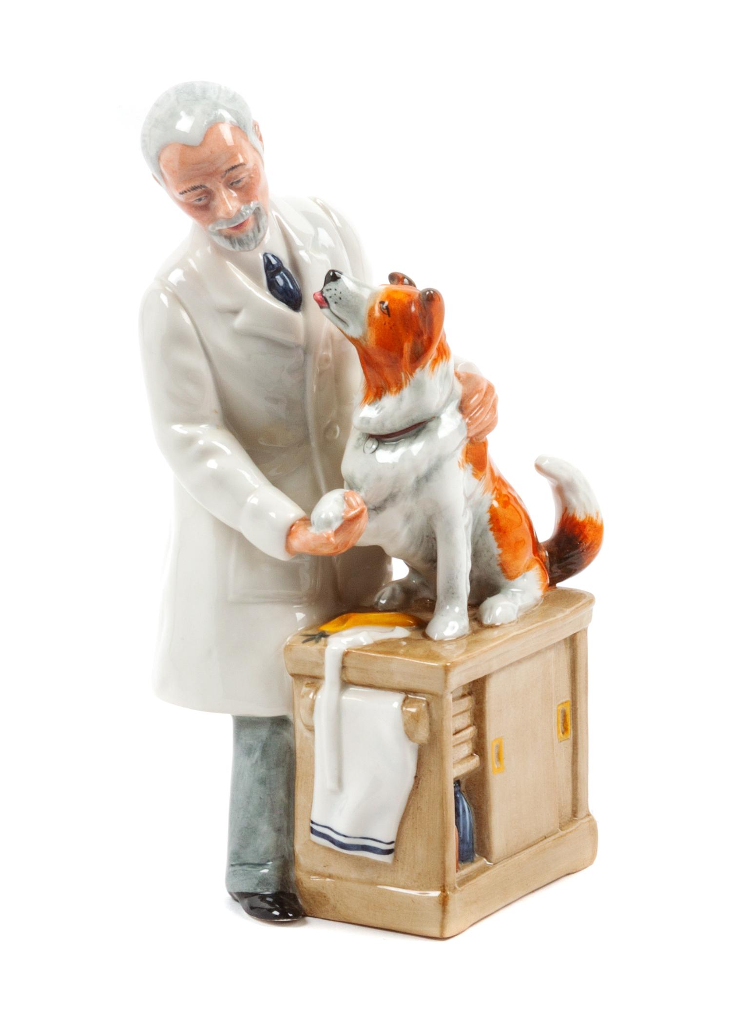 A Royal Doulton Porcelain Collie Figural Group Height 9 1/8 inches.