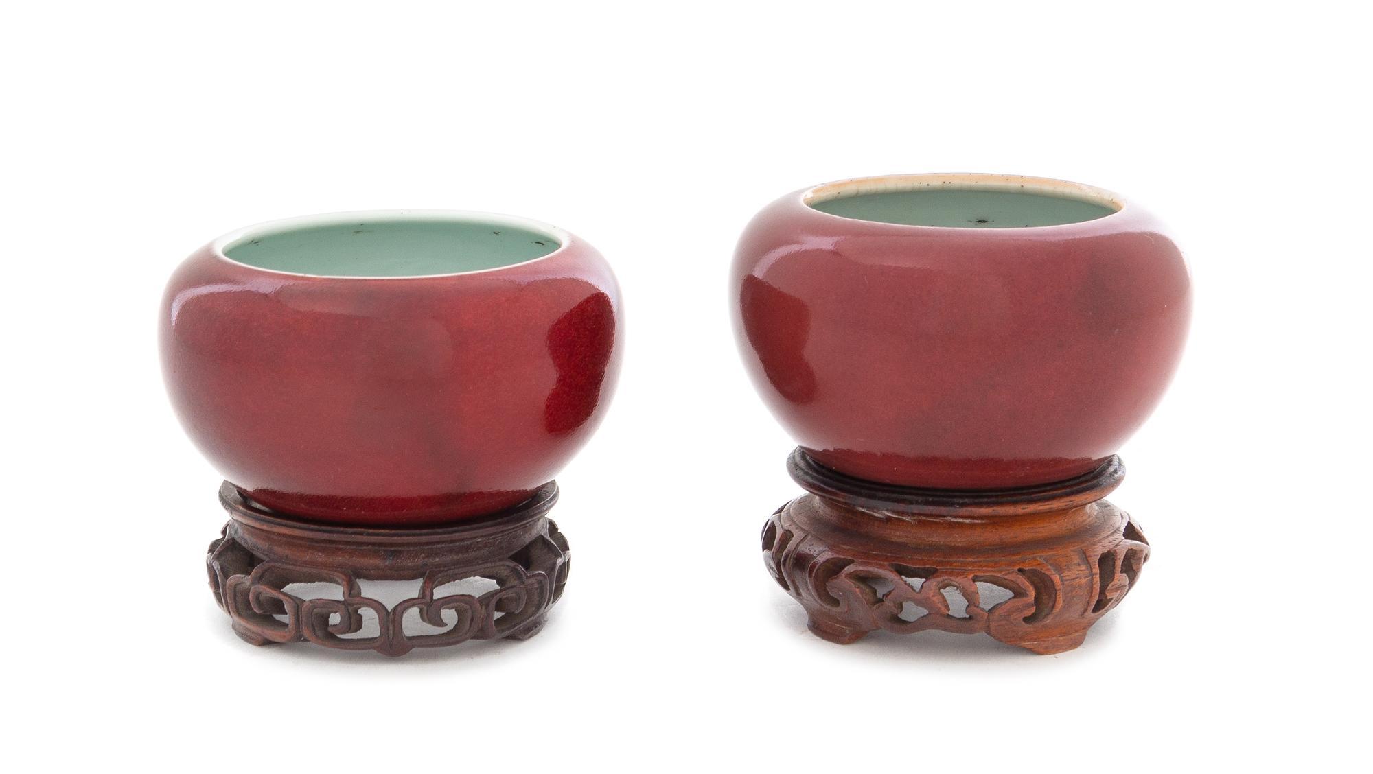 A Pair of Chinese Sang-de-Boeuf Glazed Porcelain Water Coupes Height of each 2 inches. — 19TH CENTURY