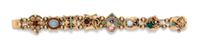 A Vinage 14 Karat Yellow Gold and Multi Gem Charm Slide Bracelet, 28.90 dwts.