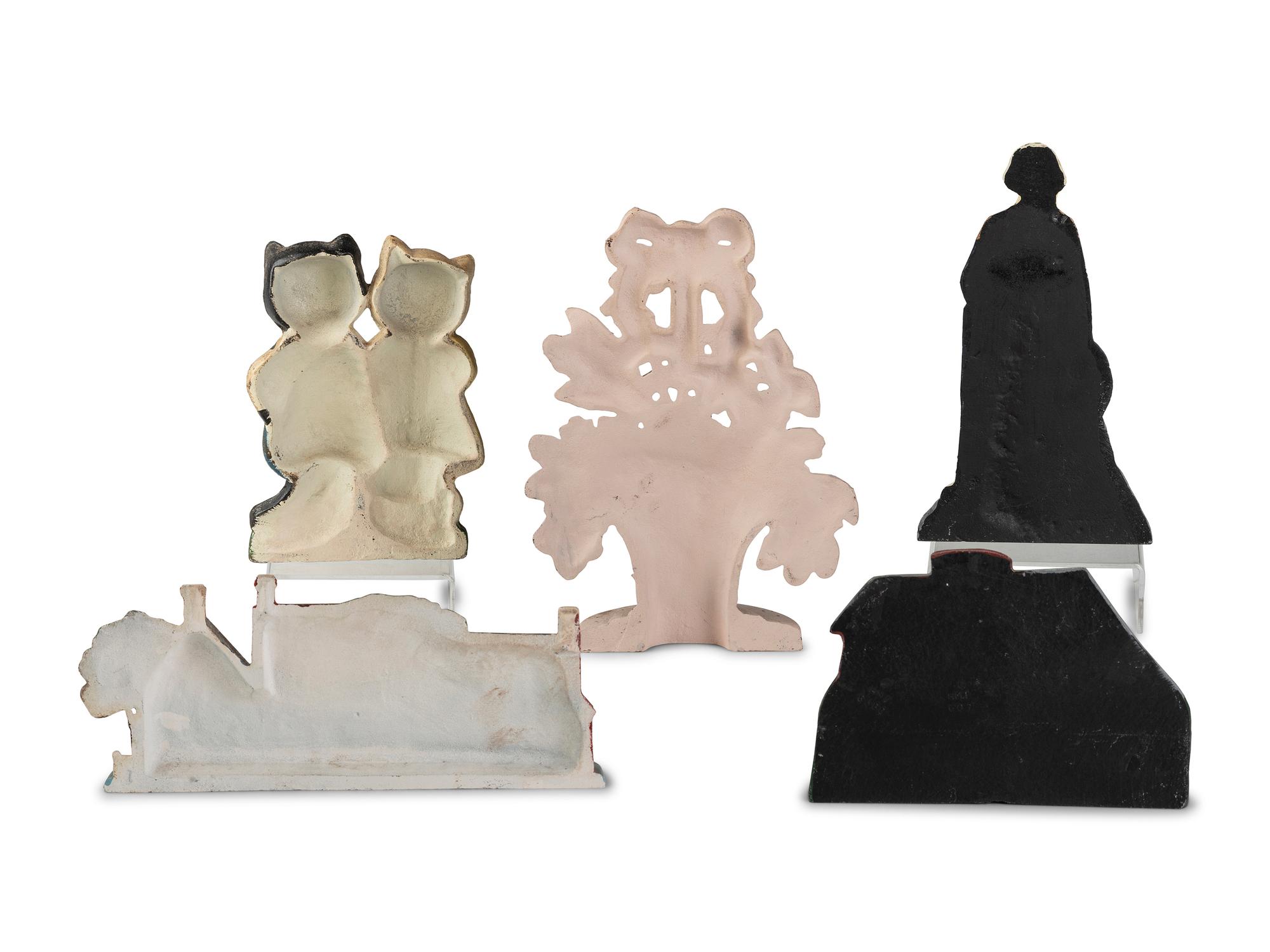 Five Figural Cast Iron Doorstops