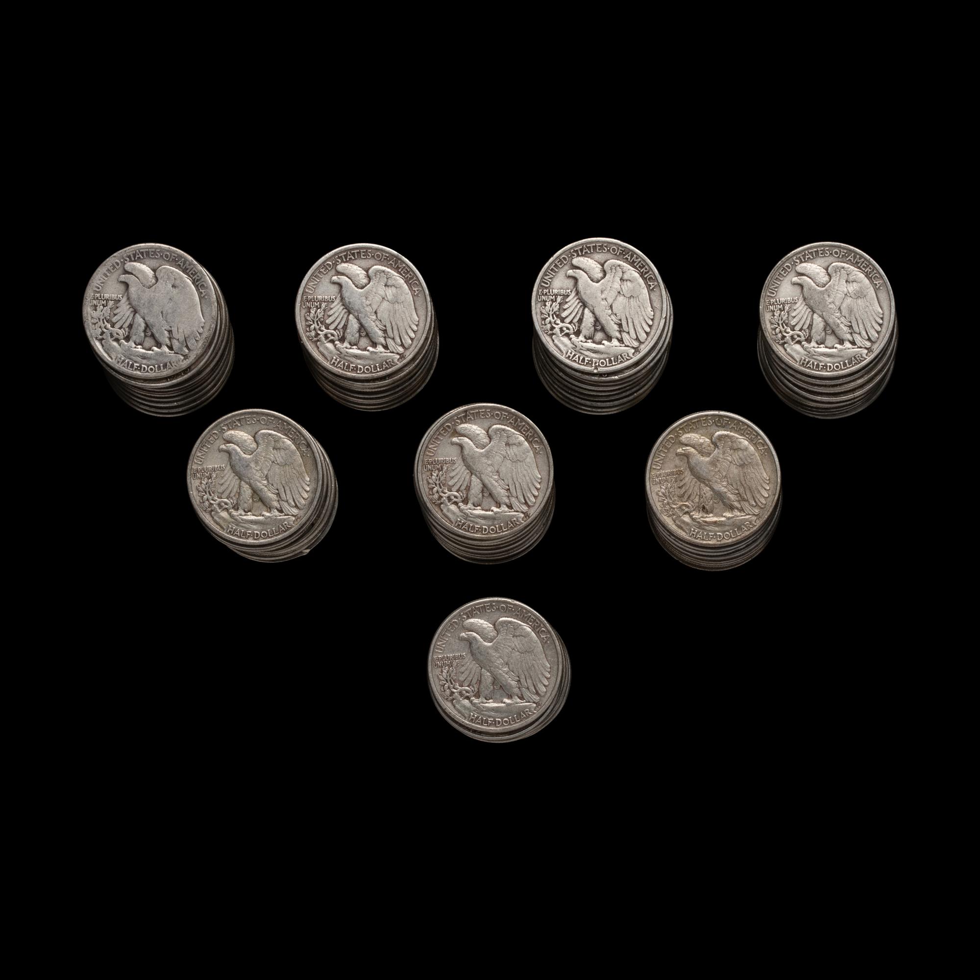 A Collection of Seventy-Six Walking Liberty 50c Coins