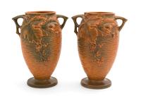 A Pair of Roseville Bushberry Pottery Vases Height 9 1/4 inches.