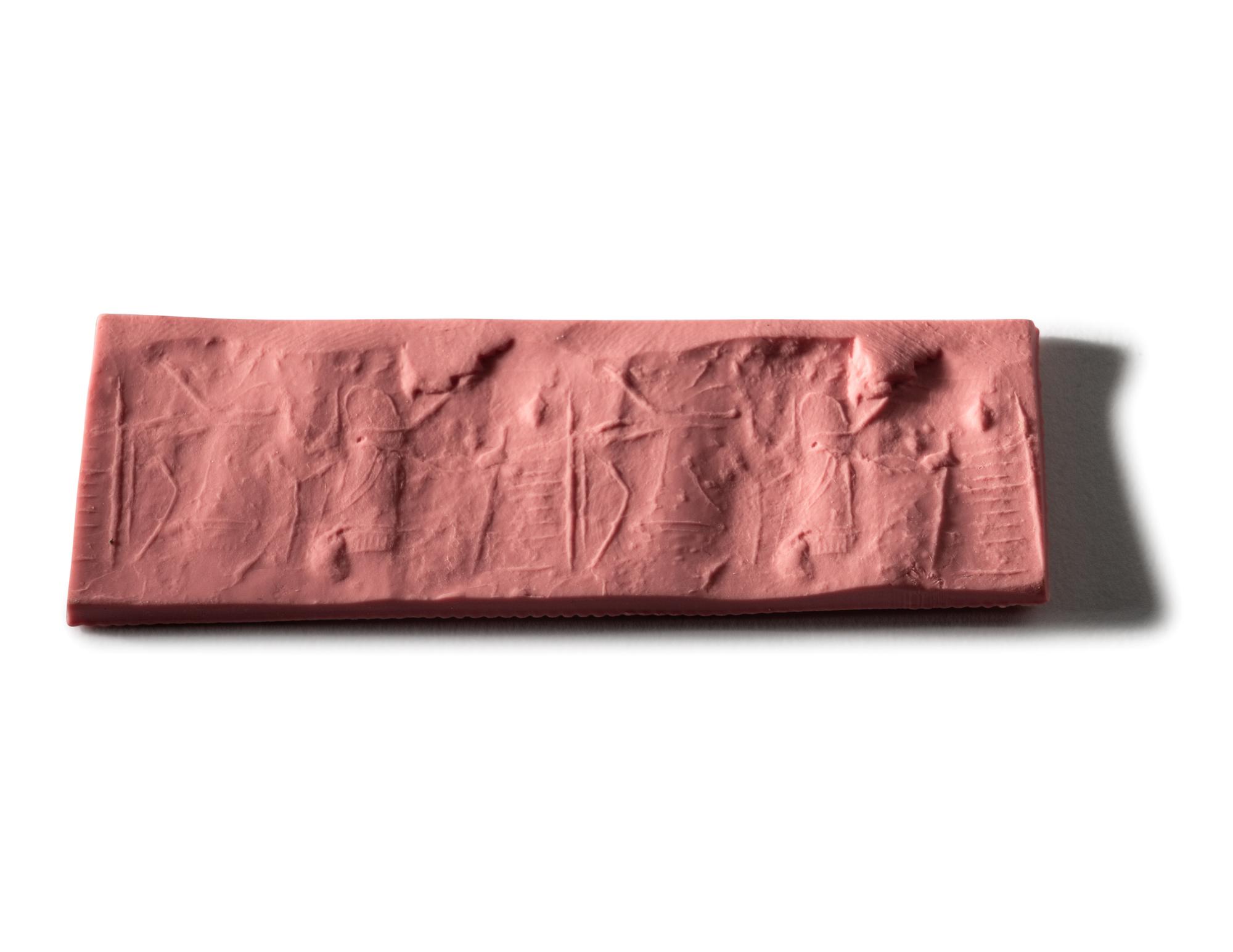 A Mesopotamian Black Steatite Cylinder Seal
