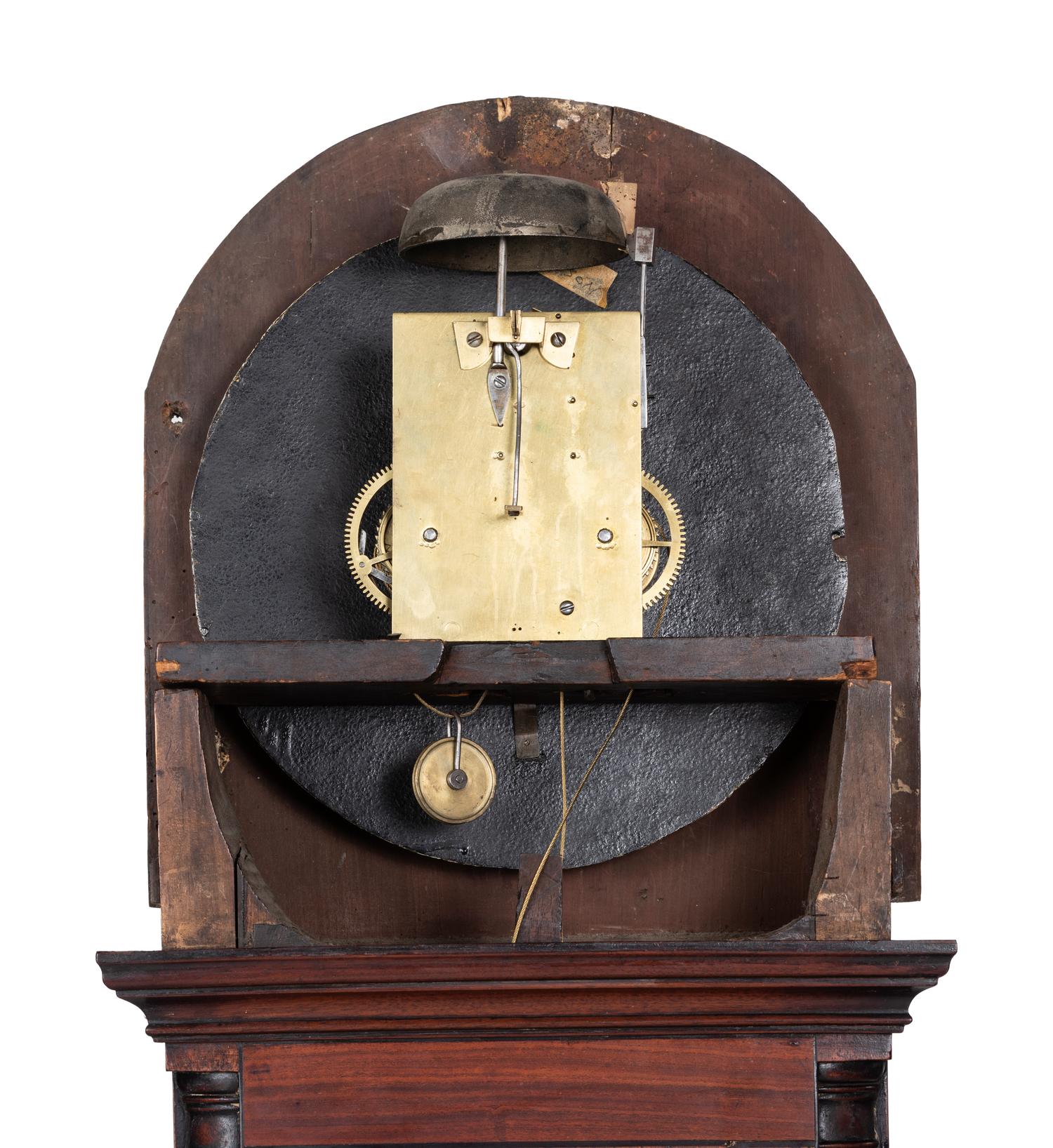 A Chippendale Inlaid and Figured Mahogany Tall Case Clock