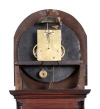 A Chippendale Inlaid and Figured Mahogany Tall Case Clock