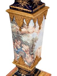 A Pair of Sèvres Style Gilt Bronze Mounted Marble and Transfer-Printed Porcelain Pedestals