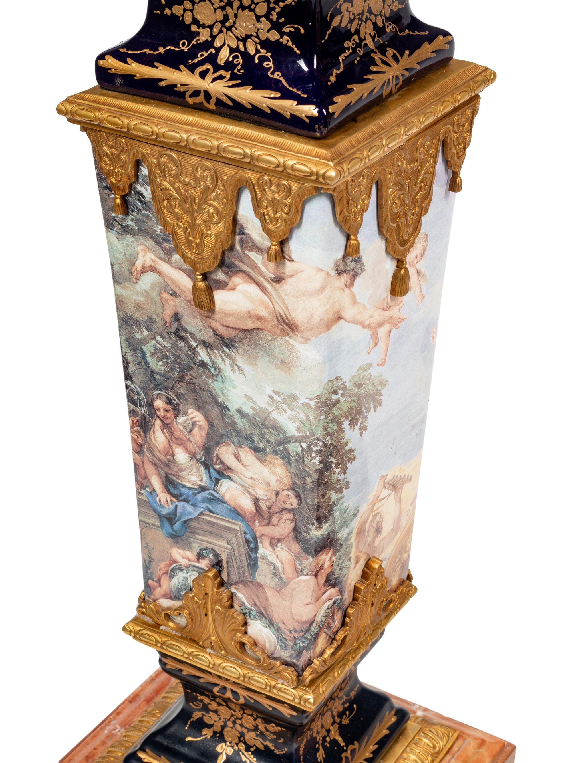 A Pair of Sèvres Style Gilt Bronze Mounted Marble and Transfer-Printed Porcelain Pedestals