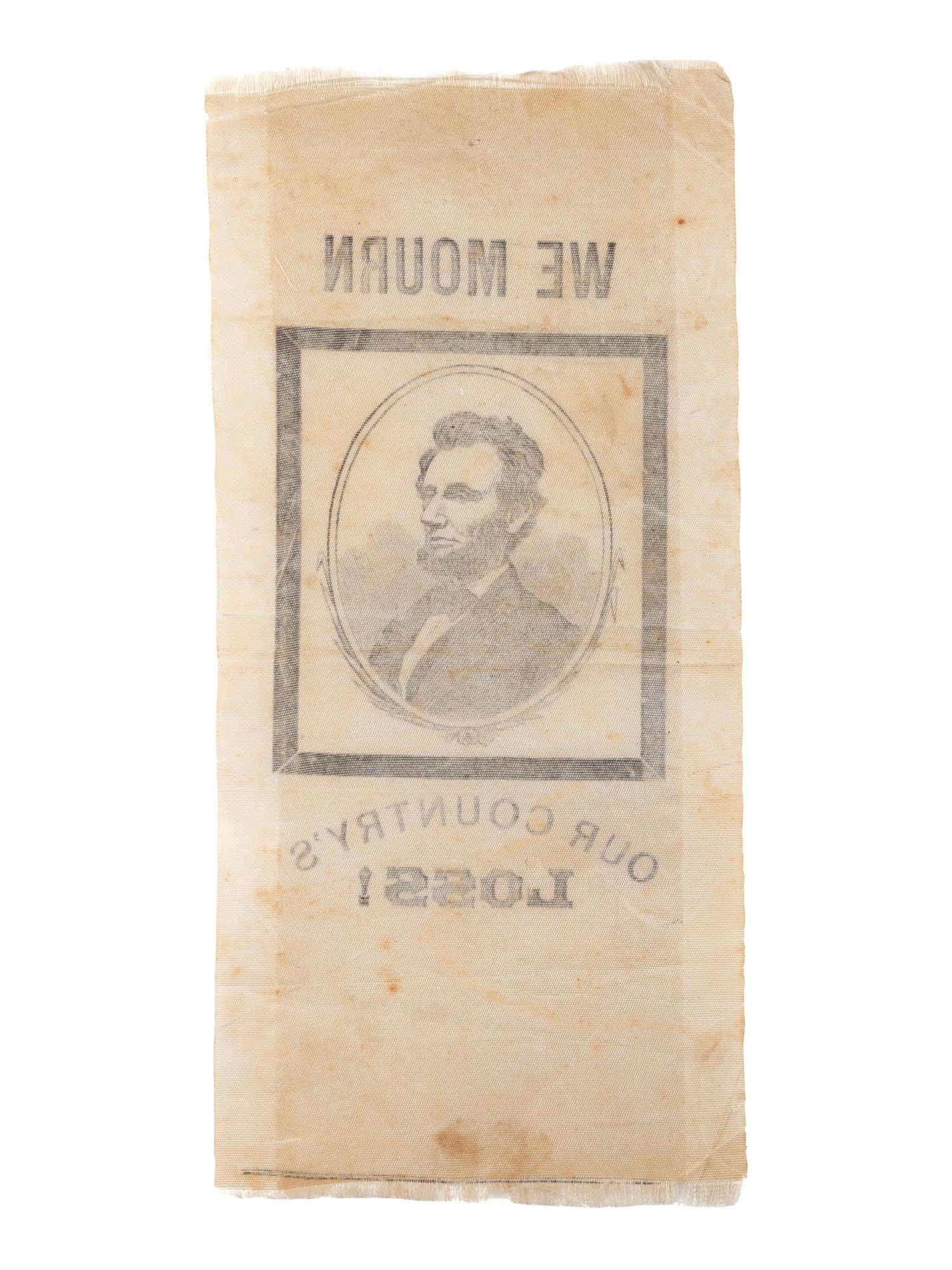 [LINCOLN, Abraham (1809-1865)]. Silk ribbon mourning the loss of Lincoln. [ With: ] Newspapers containing coverage of Lincoln's presidency.