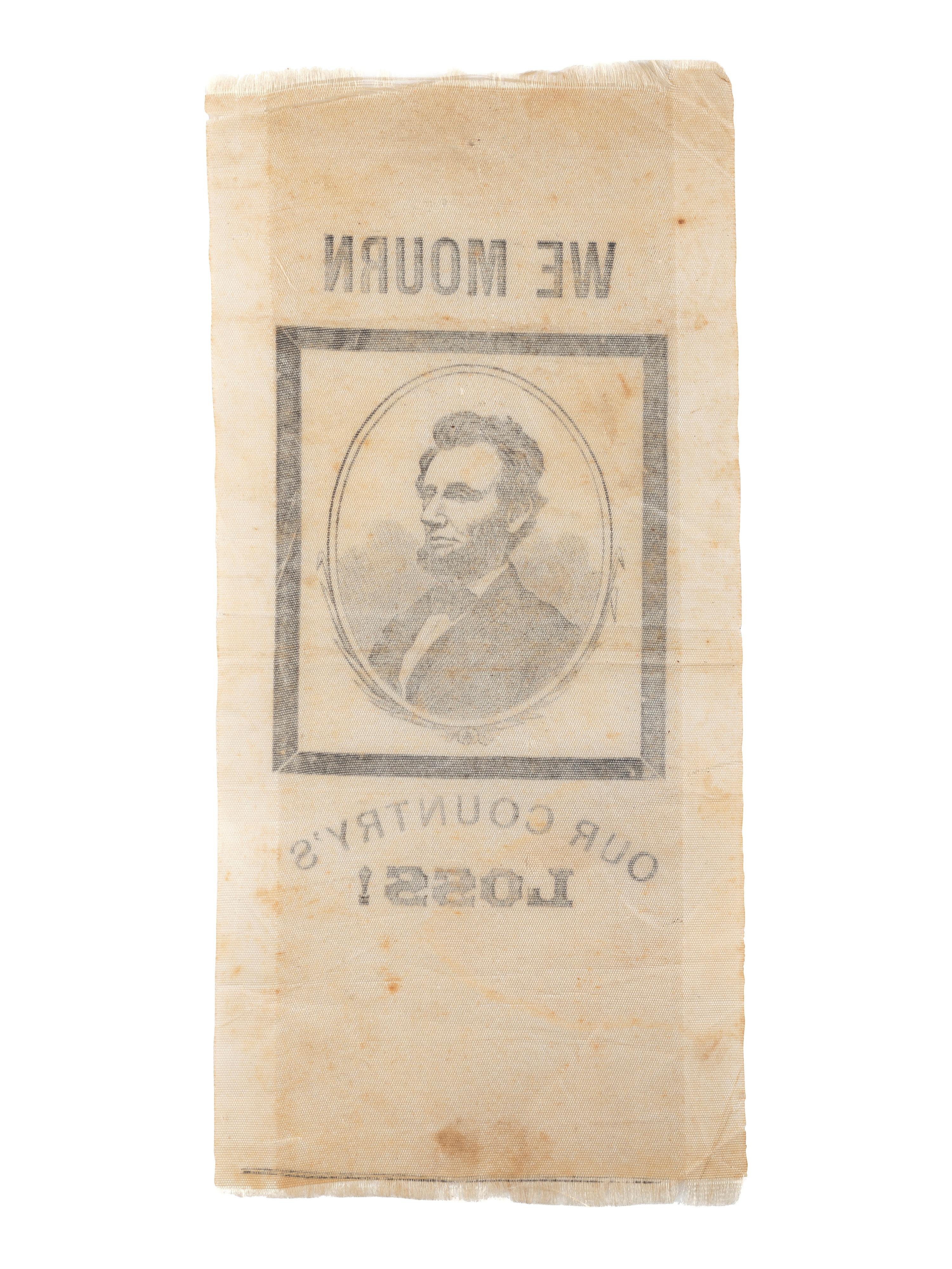 [LINCOLN, Abraham (1809-1865)]. Silk ribbon mourning the loss of Lincoln. [ With: ] Newspapers containing coverage of Lincoln's presidency.