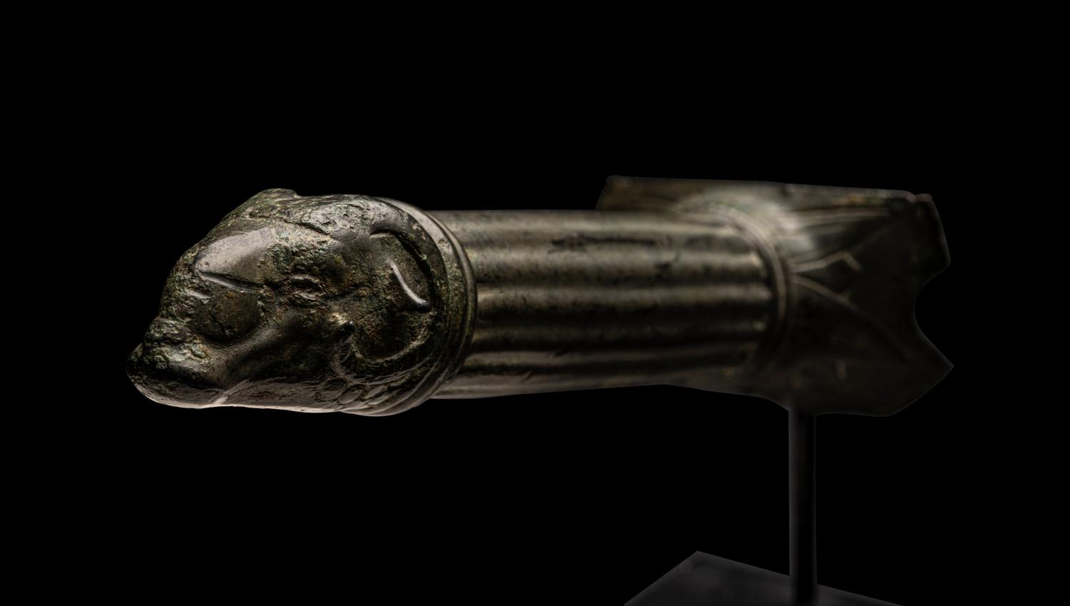 A Roman Bronze Handle with a Ram's Head