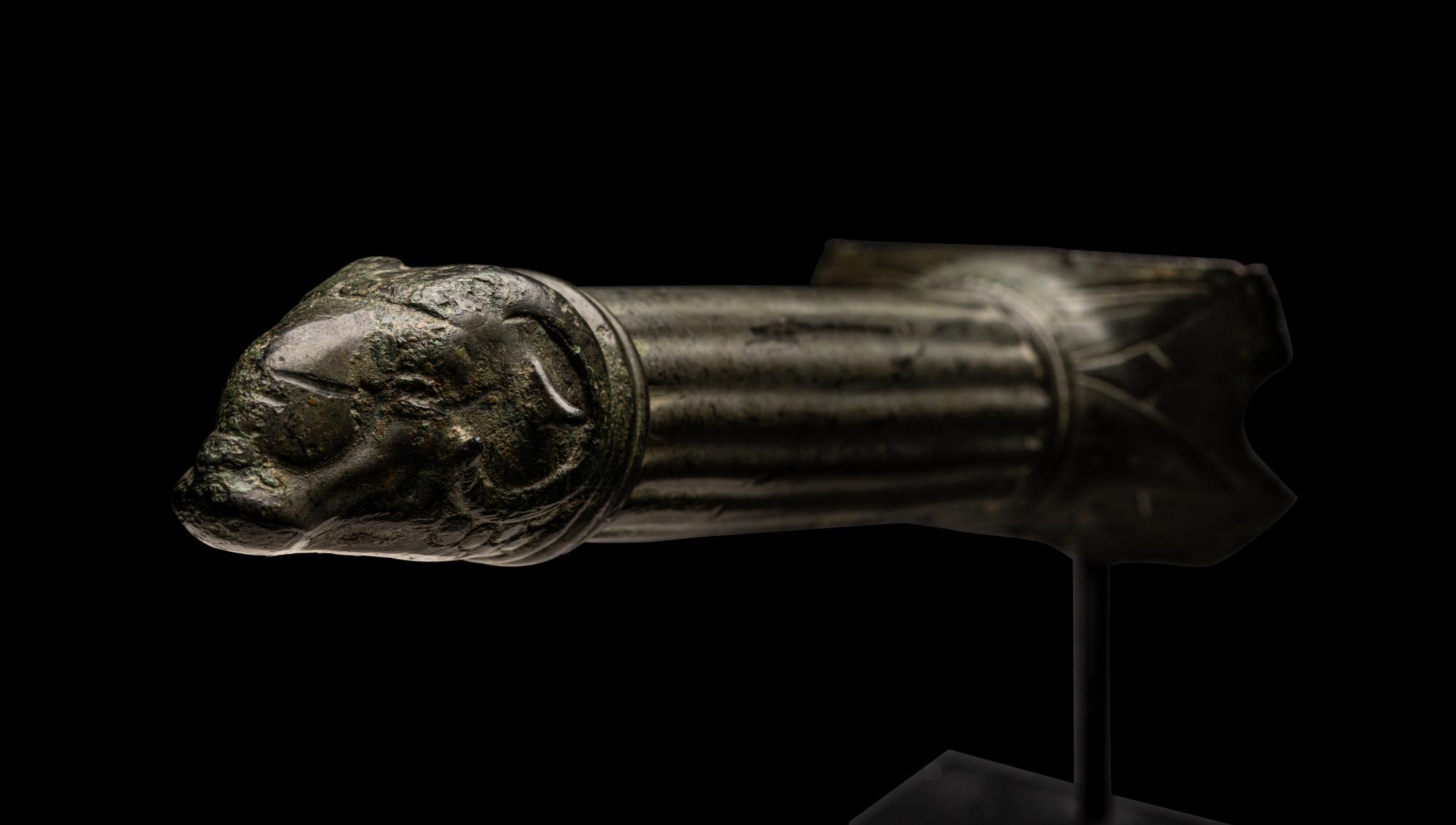 A Roman Bronze Handle with a Ram's Head