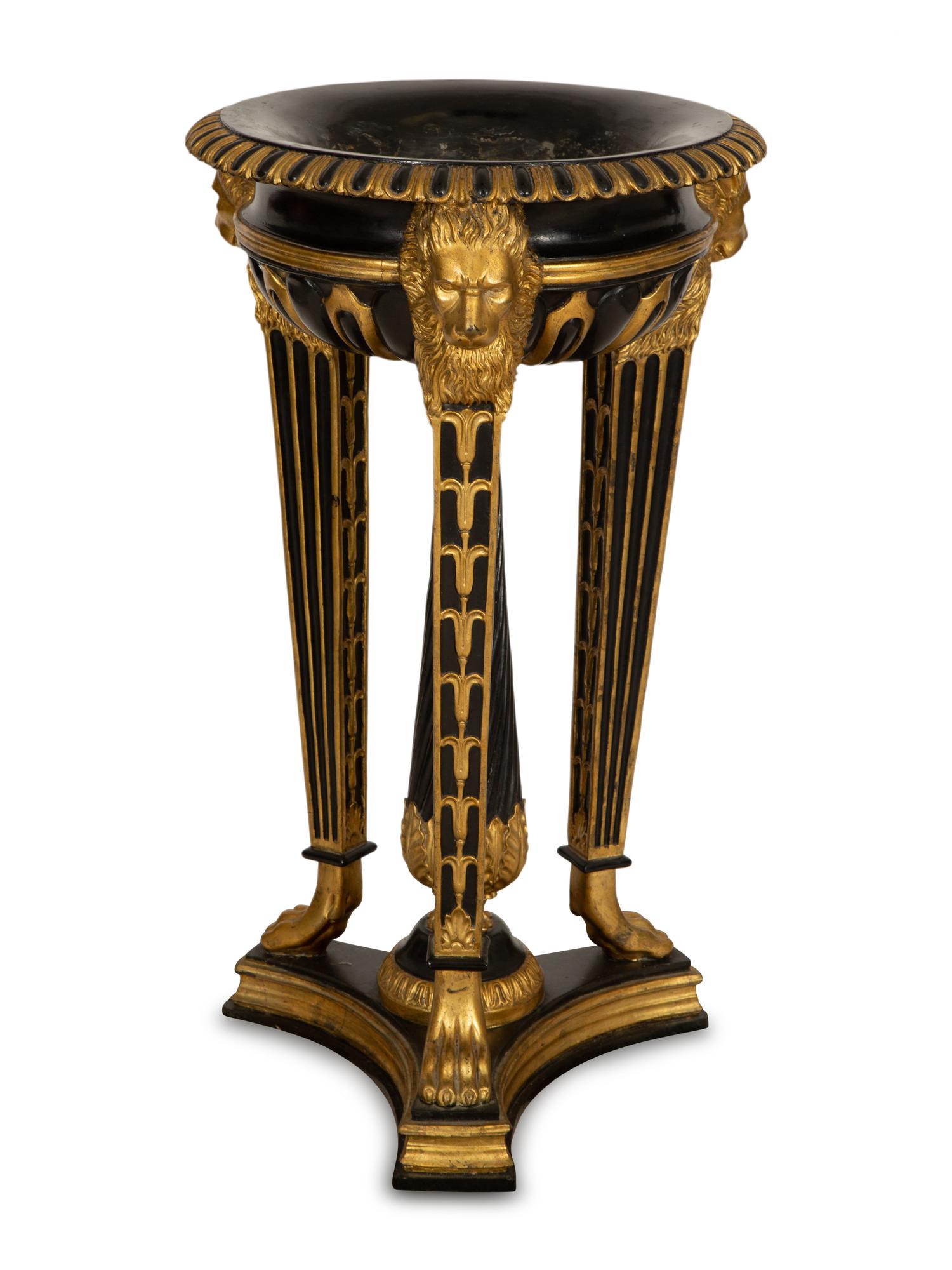 A Pair of Neoclassical Style Ebonized and Parcel Gilt Composition Jardinières on Stands